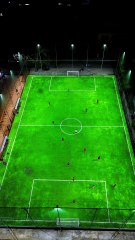 vecteezy_vertical-drone-footage-of-mini-football-match-soccer_47104790