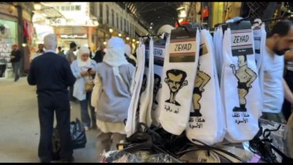 A Damasco vanno a ruba i calzini con la caricatura di Assad