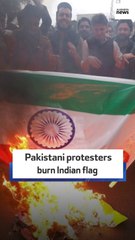 Pakistani protesters burn Indian flag