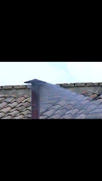 MOMENT: First smoke on second day of conclave is black, indicating cardinals haven't elected new pope