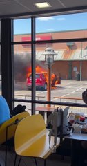 Car fire outside Eastbourne McDonalds
