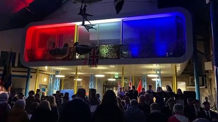 Watch Abergavenny in fine voice as the Lamp of Peace is lit inside the market hall