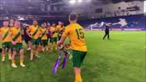 Horsham FC players and fans celebrate at the Amex Stadium after the Sussex Senior Cup is presented