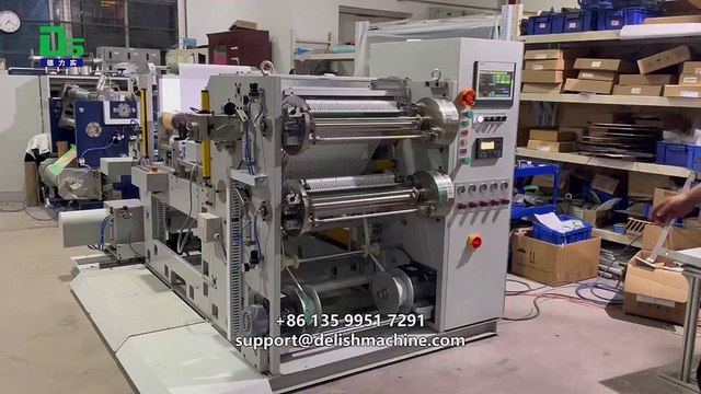 Correction tape slitter, slitting and rewinding into separate small rolls