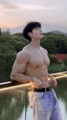 A gymnastics attitude pose for a handsome boy.