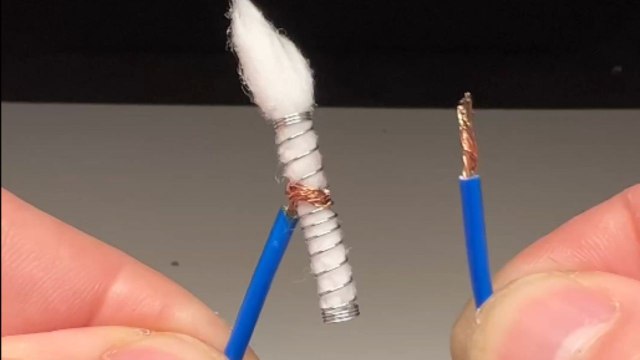 Survival genius lights a fire with just a battery, cotton, and wires