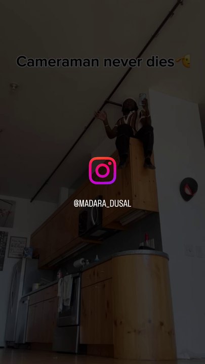 Lion couple with camera