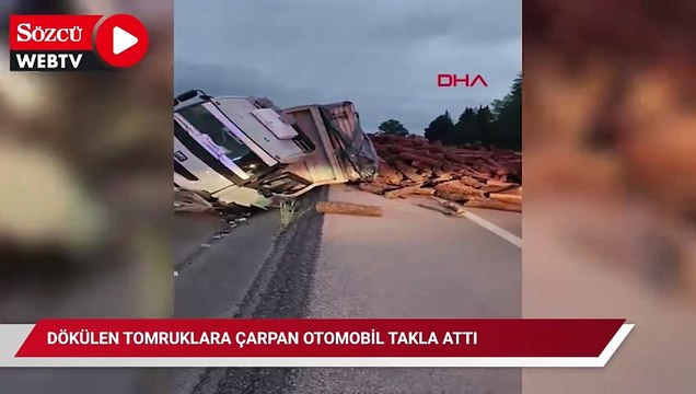 Dökülen tomruklara çarpan otomobil takla attı