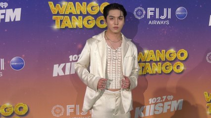 Kino attends iHeartRadio's 102.7 KIIS FM Wango Tango 2025 green carpet