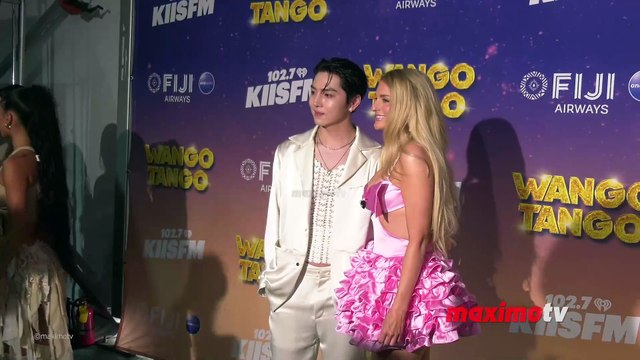 KINO and Meghan Trainor pose together at iHeartRadio's 102.7 KIIS FM. Wango Tango 2025 green carpet