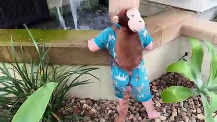 Adorable Toddler Throws Rocks in Fountain Fun! ||