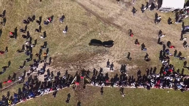 Moment bullfight spectators run for safety after rampaging animal escapes ring