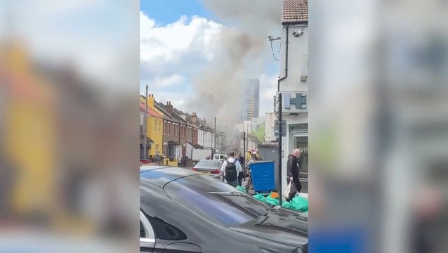 Huge fire rips through homes next to London Tube station