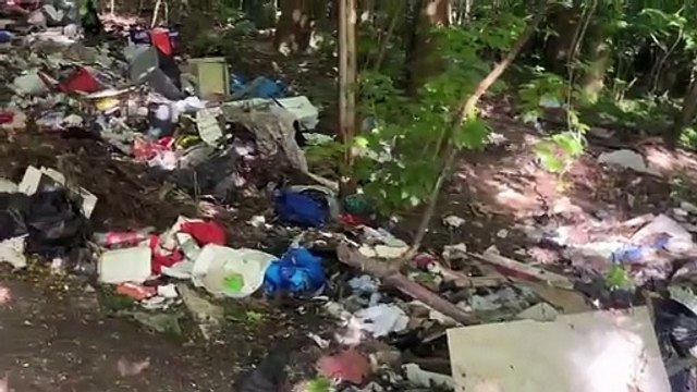 Piles of flytipping in Sheffield green space behind Park Hill Flats