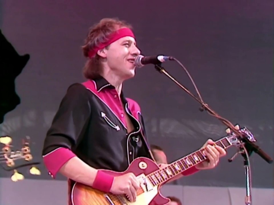 Dire Straits et Sting chantent "Money For Nothing" en live
