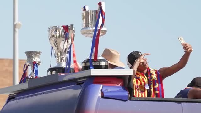 Yamal takes selfie with Barca's trio of trophies