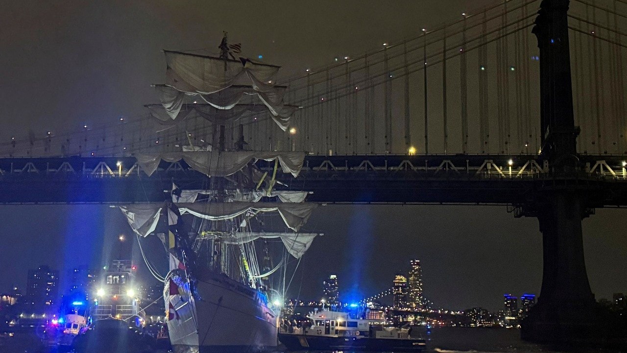 Sailors dangle high above water after Mexican Navy ship hits Brooklyn Bridge
