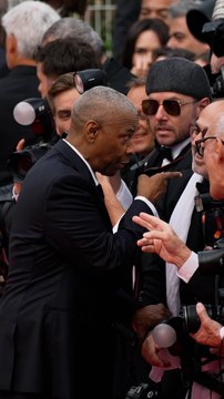 Denzel Washington Seen on Video Having Tense Exchange with Pushy Photographer on Cannes Red Carpet