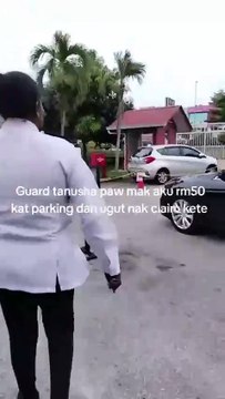 妇女违停遭勒索50 女儿报警捉女保安