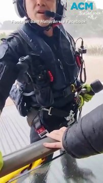 Trapped family and dogs airlifted to safety after horror floods swallow home