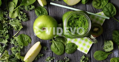 Green fruits and salad in composition