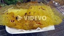Thai omelette with vegi at asian street night market for sale
