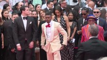 Cannes: l'équipe du film "Highest 2 Lowest" sur le tapis rouge