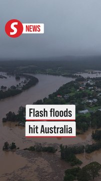 Flash floods cut off Australian towns, as more rain set to fall