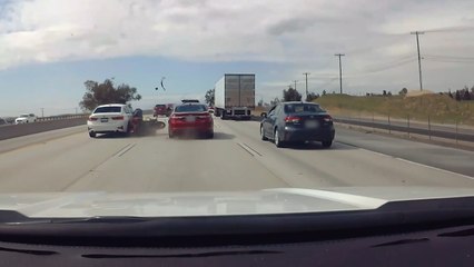 Motorcycle Crashes Into Multiple Vehicles