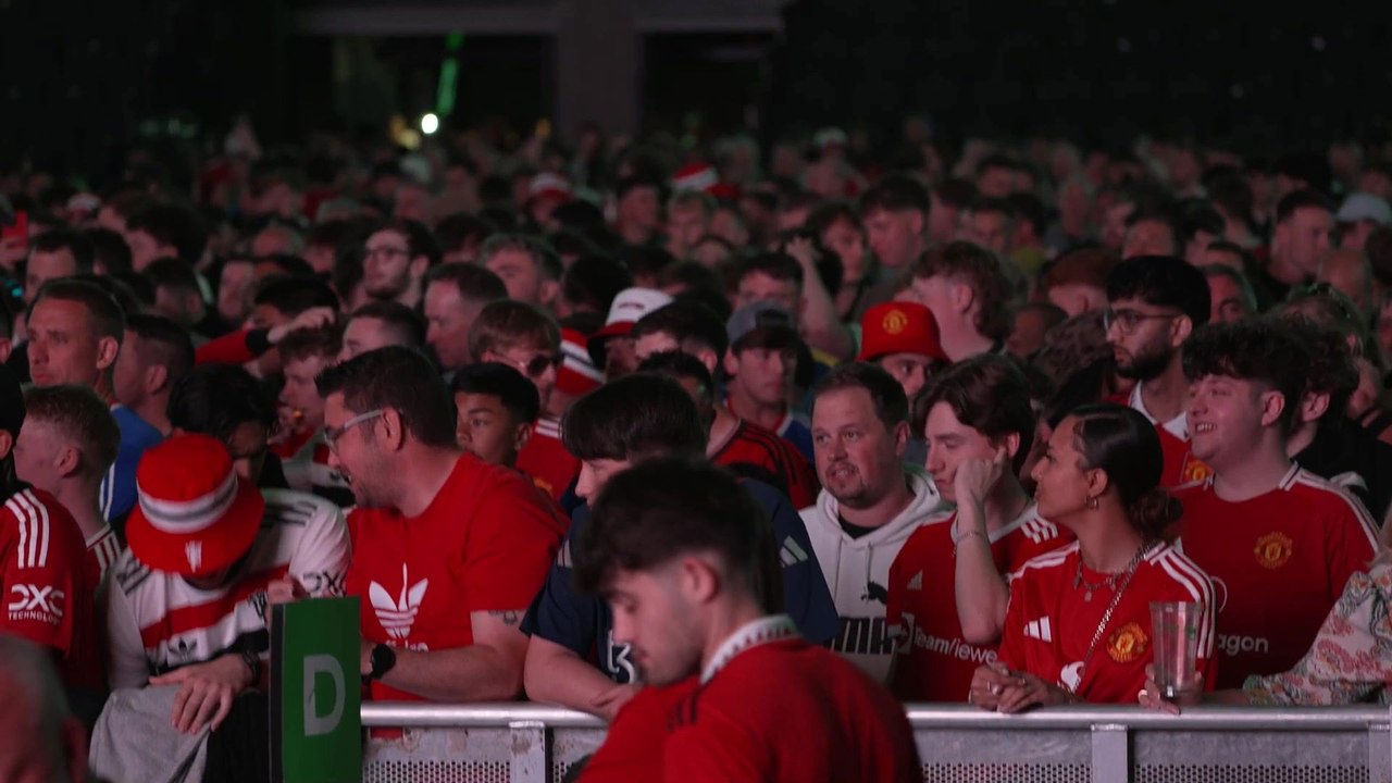 Utd fans with pyro and chanting watching Europa League final at the AO Arena