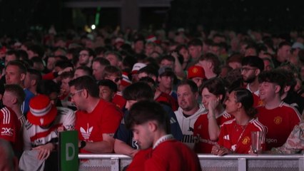 Utd fans with pyro and chanting watching Europa League final at the AO Arena