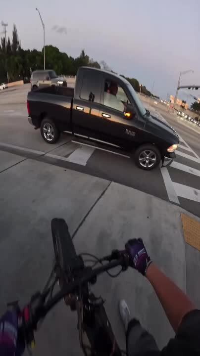 Guy Topples Off His Dirtbike While Doing Stoppie on Sidewalk