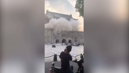 Tourists flee as 600-year-old Ming Dynasty tower roof collapses in China