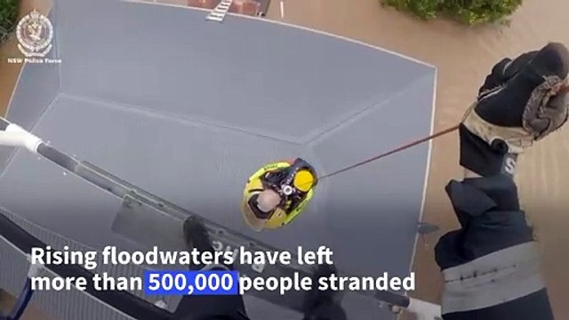 Australians rescued off rooftops amid deadly floods