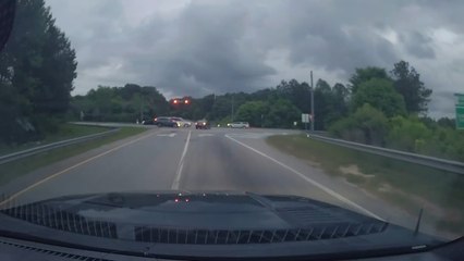 Car Jumps Signal and Causes Collision at Intersection