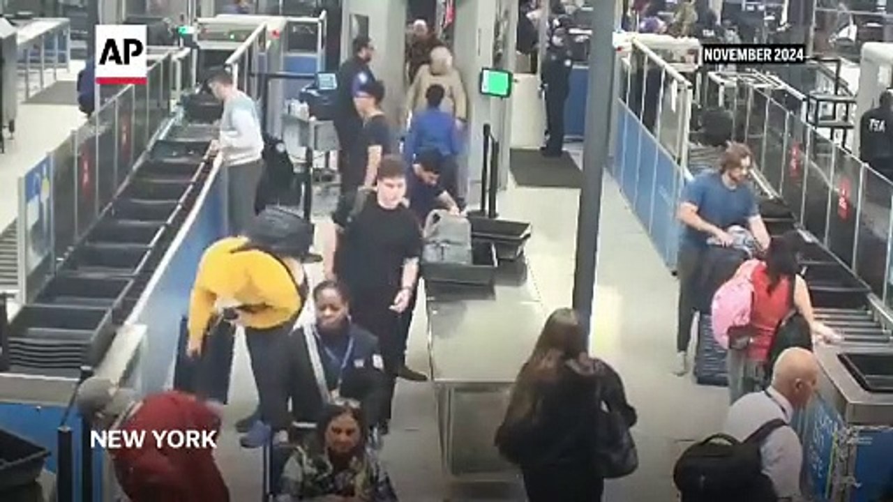 Surveillance video shows New York-to-Paris flight stowaway slipping past gate agents