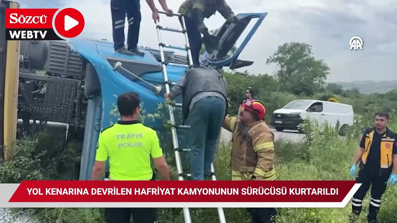 Arnavutköy'de yol kenarına devrilen hafriyat kamyonunun sürücüsü kurtarıldı