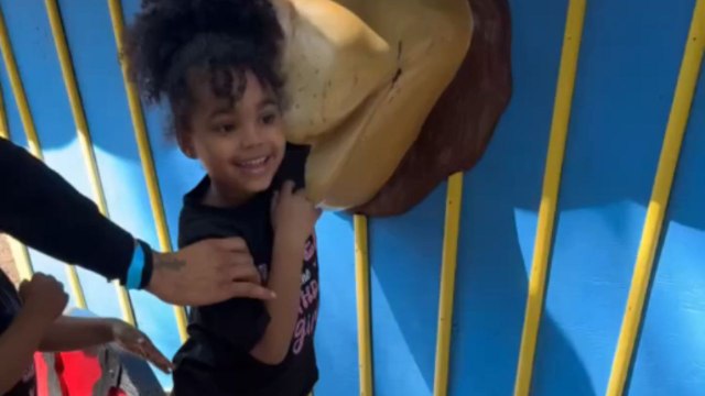 Dad pretends a lion eats his arm to make his kids laugh