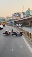 Rider Loses Control on Zebra Crossing, Crashes into Divider