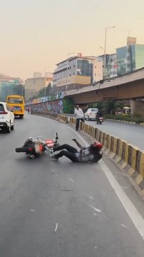 Rider Loses Control on Zebra Crossing, Crashes into Divider
