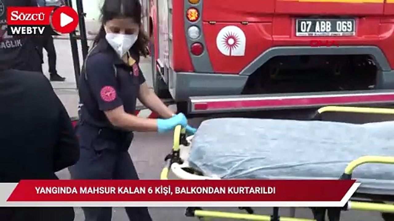Yangında mahsur kalan 6 kişi, balkondan kurtarıldı