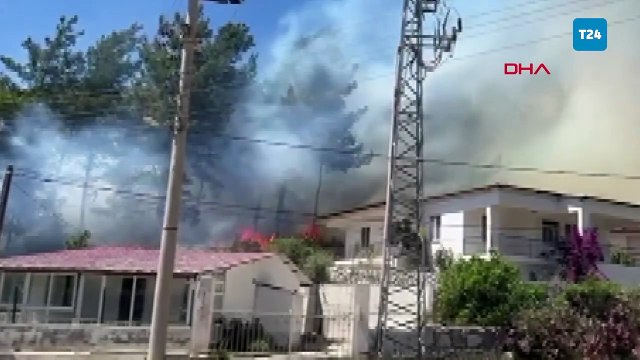 Marmaris'te yerleşim yerinin yakınında orman yangını çıktı; havadan ve karadan müdahale sürüyor