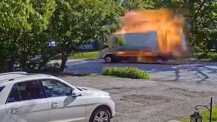 Moment truck explodes while driving through residential neighbourhood