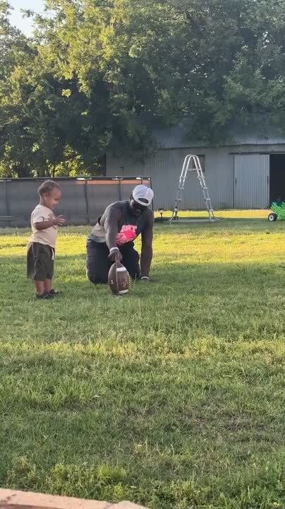 Son Adds His Own Style to Kick Football