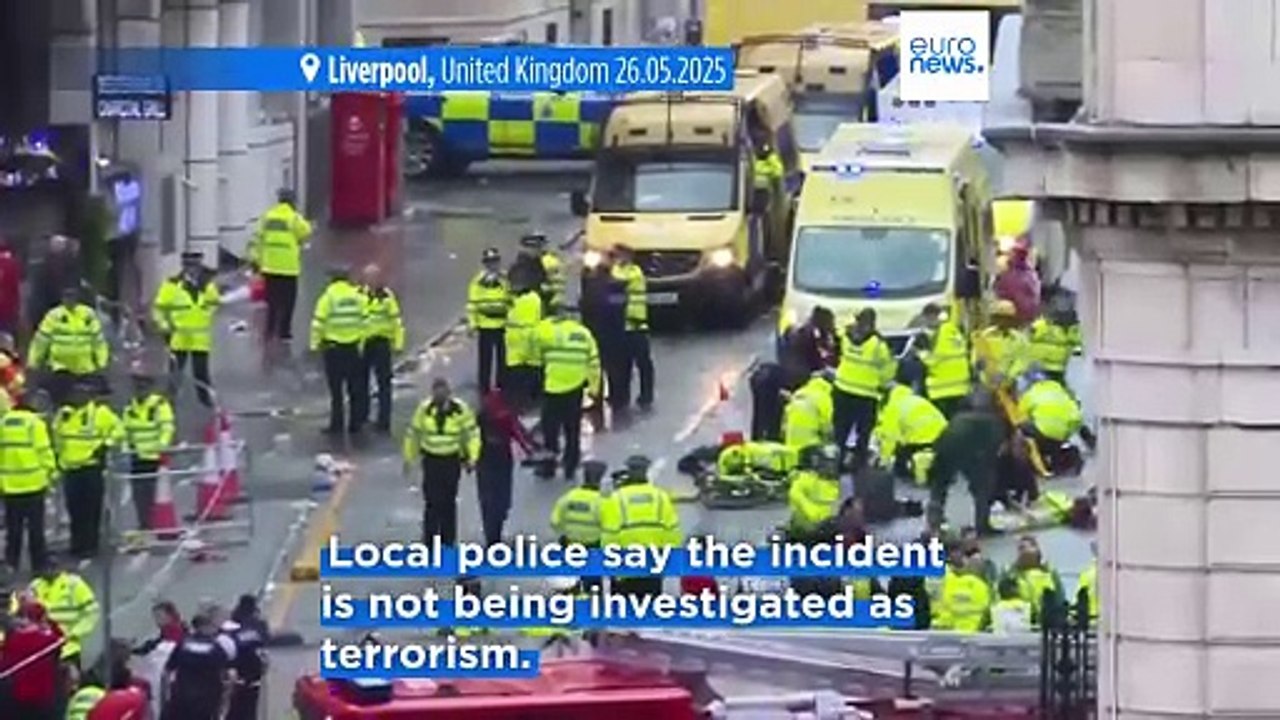 Dozens injured after car strikes crowd during Liverpool FC title celebration