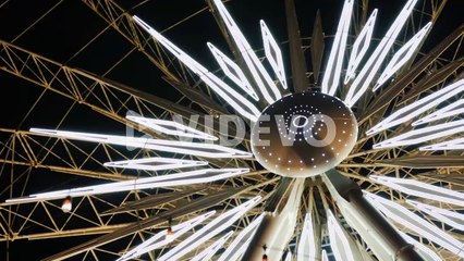 Illuminated Center of Ferris Wheel
