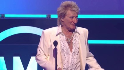 Rod Stewart swears live at AMAs as children make surprise joint appearance