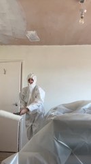 Woman Trying to Paint Ceiling Drops Splatters on Her Face