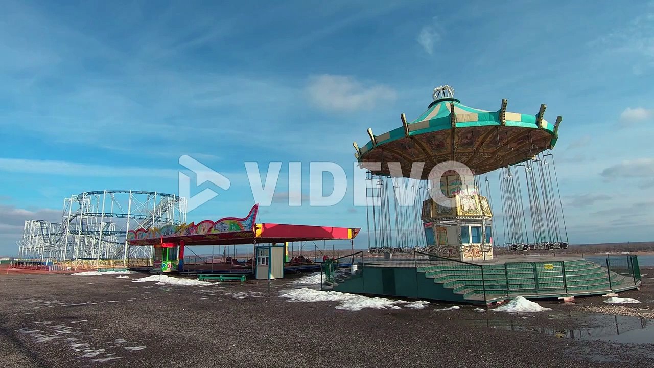Abandoned Carnival Rides At Empty Amusement Park