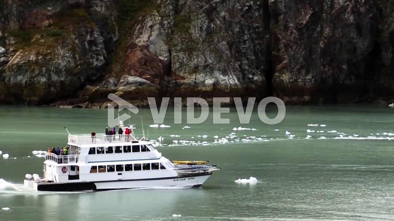 Boat with tourists, visiting Glacier Bay National Park, Alaska